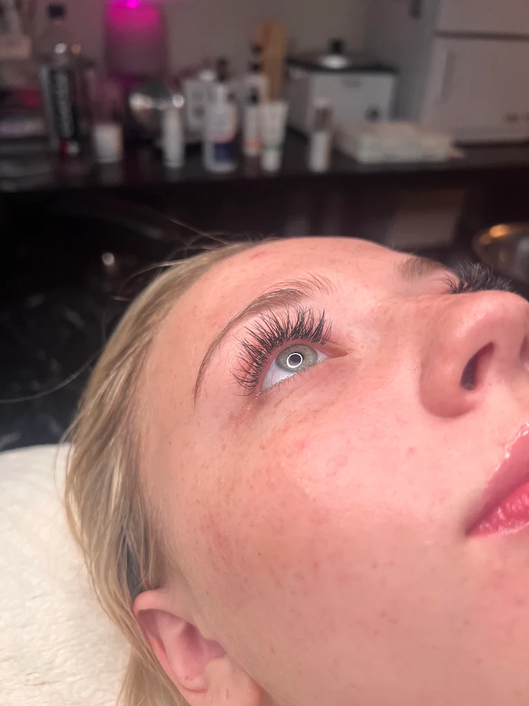 Detailed lash application in progress